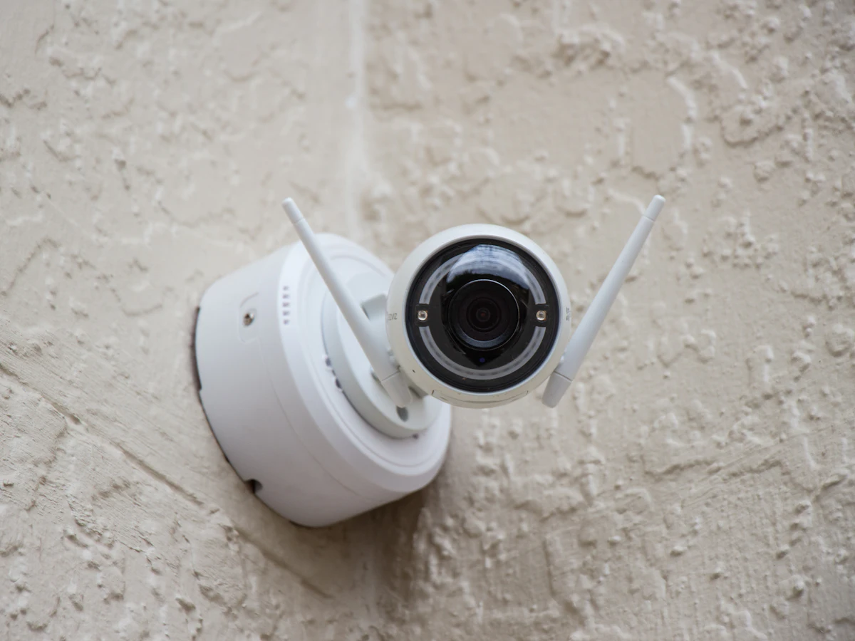 Security camera mounted on a house wall