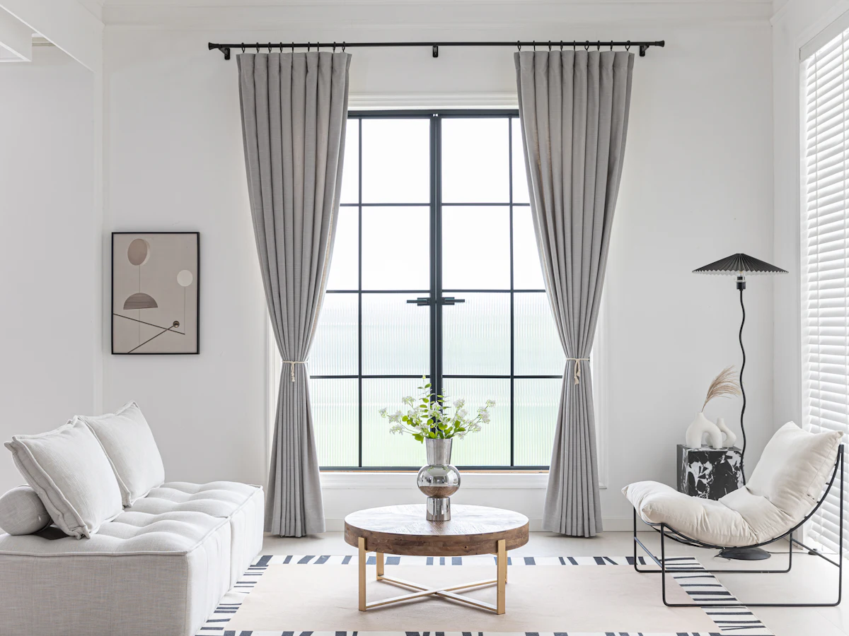 Living room with floor-length curtains