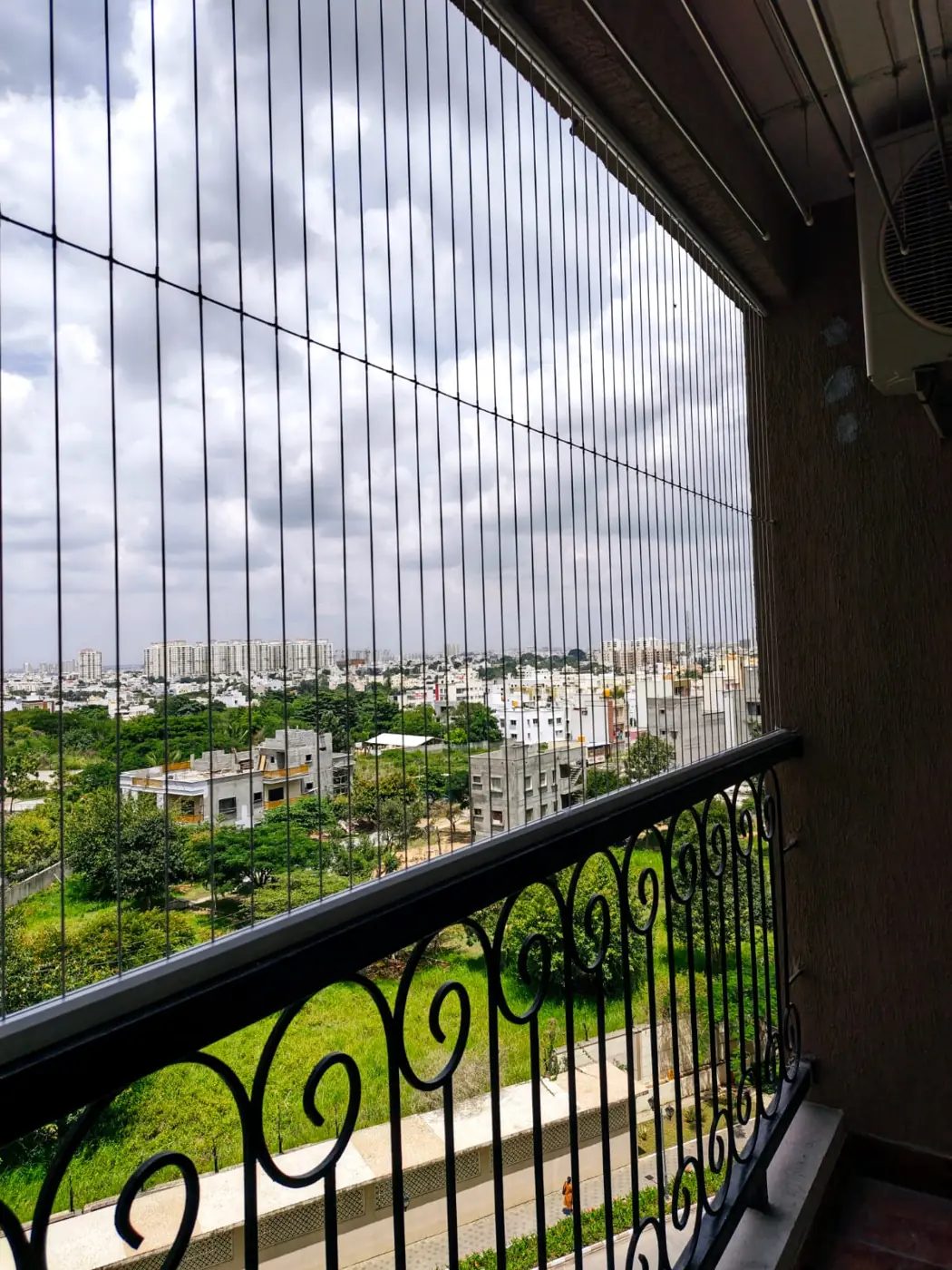 High-rise balcony with an open city view