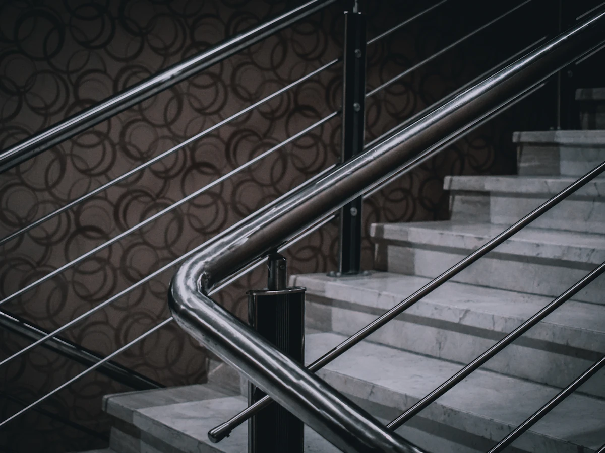 Stainless steel railing along a staircase