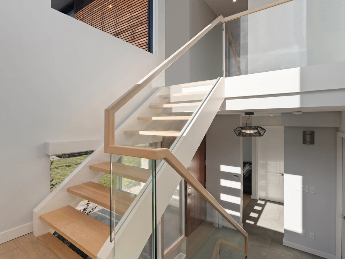 Glass and steel staircase railing